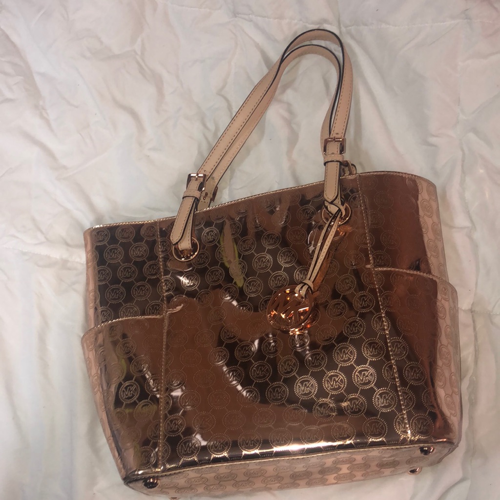 Michael Michael Kors Rose Gold Top Handle Bag.